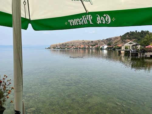 View of Lake Ohrid from the outdoor seating area.  at Restorant Leza in Lin