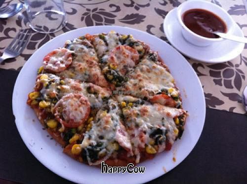 For India, I was pretty impressed by this pizza. I'm a real pizza connoisseur, but I'd gladly pay $3 for this 11' pizza back home.  at Orchids Restaurant in Varanasi