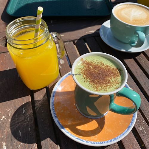 orange juice and coconut matcha latte at The Gallery Cafe in East London