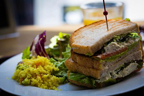 Lunch Set - Hummus Sandwich with Salad, Couscous and carrot cake on the side  at Pure Cafe in Tokyo