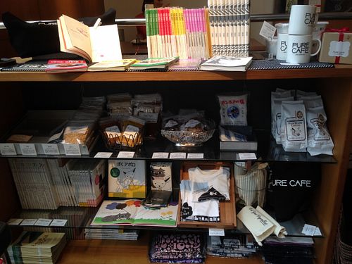 Books and merchandise at Pure Cafe in Tokyo