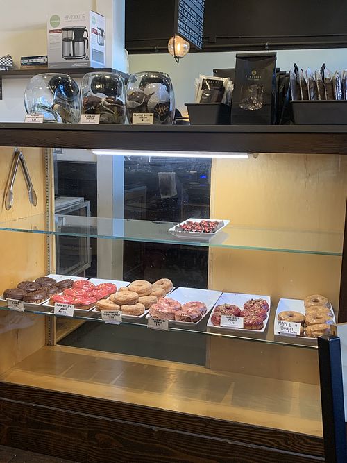 Donut case.  at Timeless Coffee Roasters and Bakery in Oakland