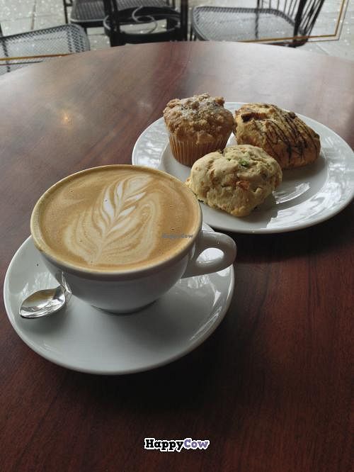 Almond latte and assortment of scones. at Timeless Coffee Roasters and Bakery in Oakland