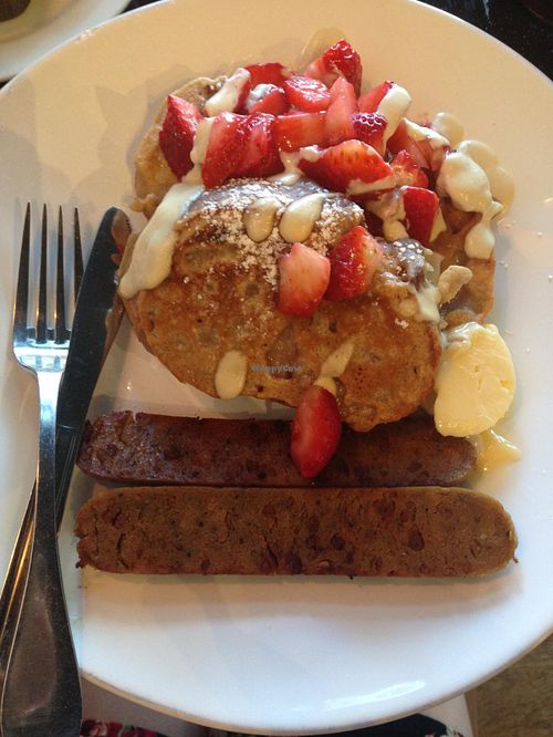 Strawberry French Toast with vegan apple sage sausage at Timeless Coffee Roasters and Bakery in Oakland