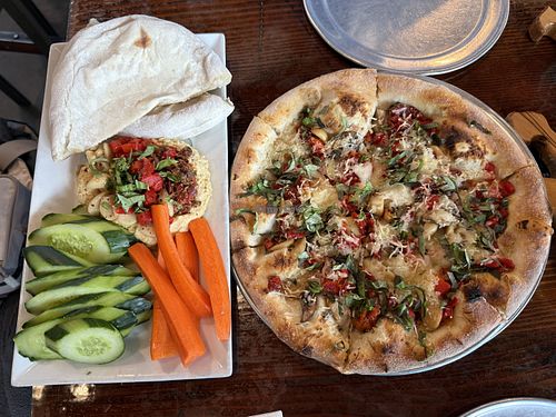 Hummus plate and Farmers Market pizza made vegan  at San Juan Island Brewing Company in San Juan Island