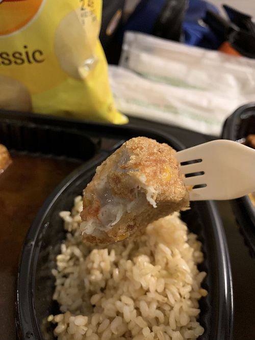 Eating leftover taro fritters back in my hotel room—they were still tasty!!!  at Cisu Vegan House in Hanover