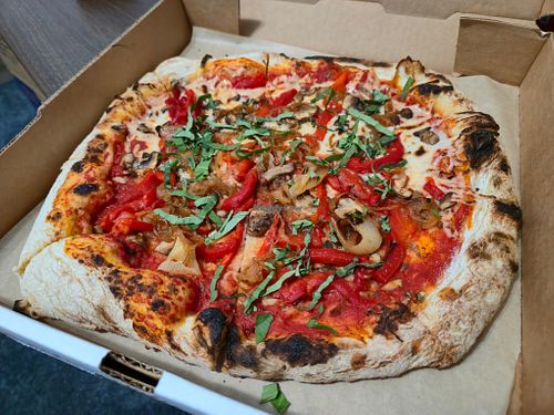 Pizza with half vegan cheese at Treno Pizzeria & Taproom in Temple