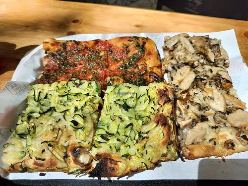 Tomato with herbs (delicious and a bit spicy), zucchini, and mushrooms (amazing!) at Pizza Gegè in Rome
