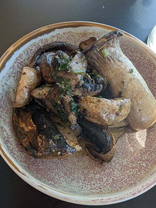 side of garlic mushies at For Change Cafe in Bellfield