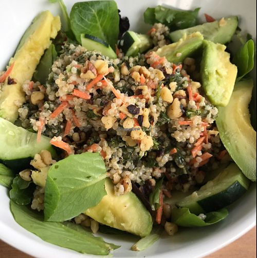 Mixes greens with quinoa and avocado at Mango Bistro in Englewood