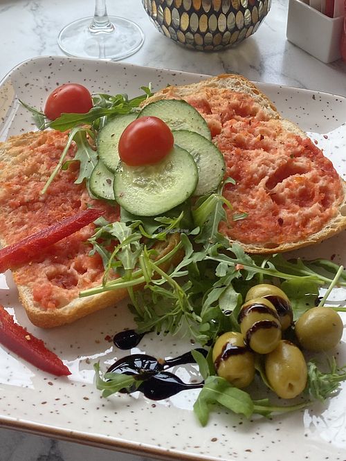 White ciabatta, tomato pesto & tomatoes with salad & olives  at Café Mozart in Mallorca