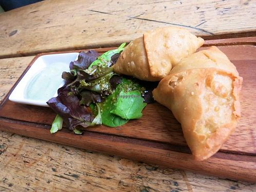 Pumpkin and Celeriac Samosas with watercress raita at The Green Rocket Cafe in Bath