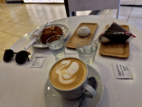 Decent coffee with home made almond milk. Chocolate croissant was great - ask to heat it up to make it crispy. Rice thing and moshi were OK. Friendly staff. at Toki Moment in Buenos Aires