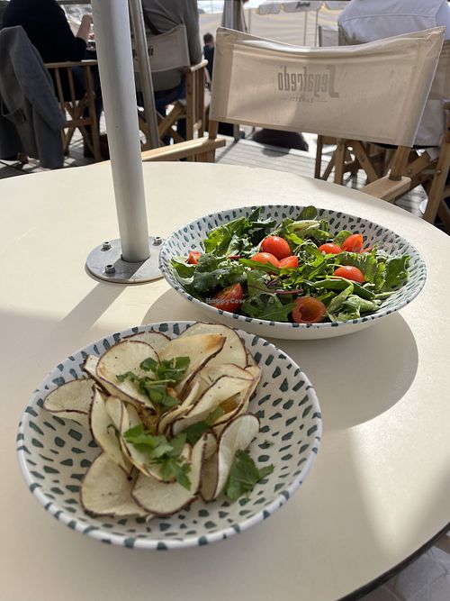 Home made vegan potato chips and hummus.  at Praia da Luz in Porto