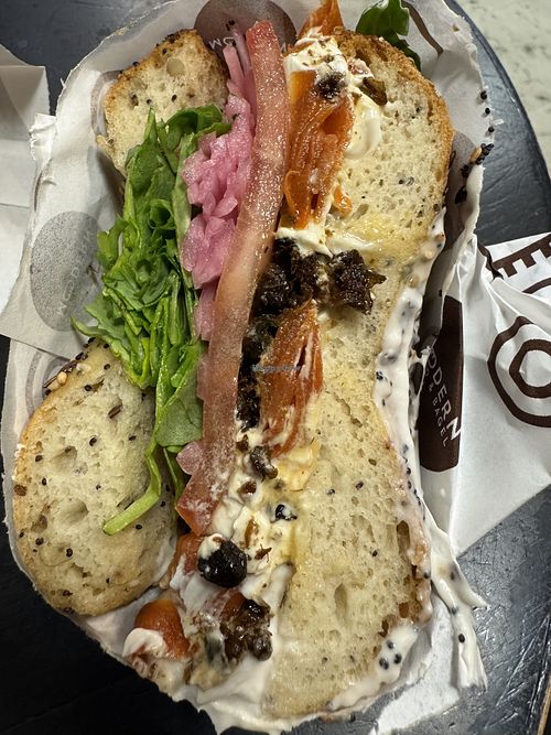 Vegan lox with arugula, tomato, onion, and capers  at Modern Bread & Bagel - Chelsea in New York City