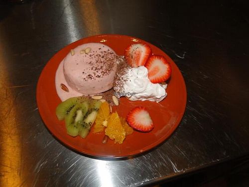 Vegan Ice cream with whipped soycream and fruits at Princesa do Castelo in Lisbon