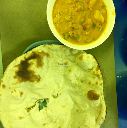 vegetable curry and naan bread. SPICY!  at Nisha Restaurant in Luang Prabang