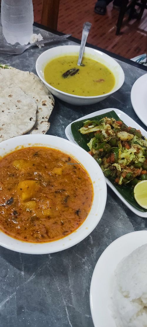 Chapati, dal dry, veg jalfrazi, aloo methi at Nisha Restaurant in Luang Prabang