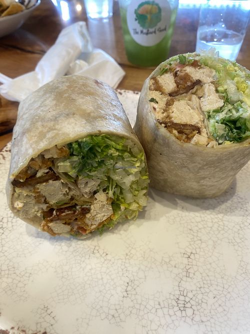 Vegan Crispy Chick’n’ BLT Wrap (could have had more sauce or a side of Valentina) - little dry imo but still good! HUGE serving! 😅  at The Mustard Seed in Cerritos