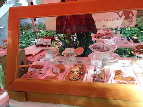 Petunias farmers market case, delicious baked goods! at Petunia's Pies and Pastries in Portland