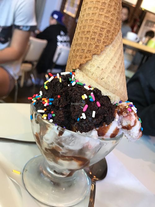 Sundae with strawberry ice cream with s’mores ice cream and brownie bites and chocolate sauce at Petunia's Pies and Pastries in Portland