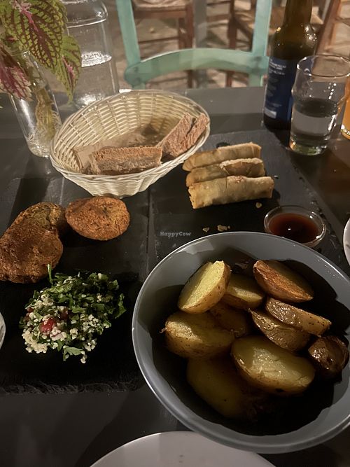 Falafel, tabbouleh, spring rolls, sautéed potato  at Gaidaros Cooperative Cafe - Γάιδαρος Συνεργατικό Καφενείο in Vamos