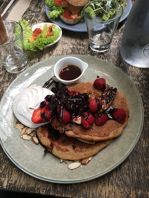 Pancakes with whipped coconut cream  at East St Cafe and Bar in Nelson