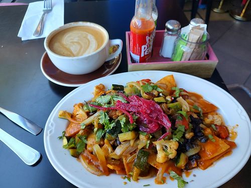 Vegan Chilaquilies, oat latte at Corazon Cafe  in San Luis Obispo