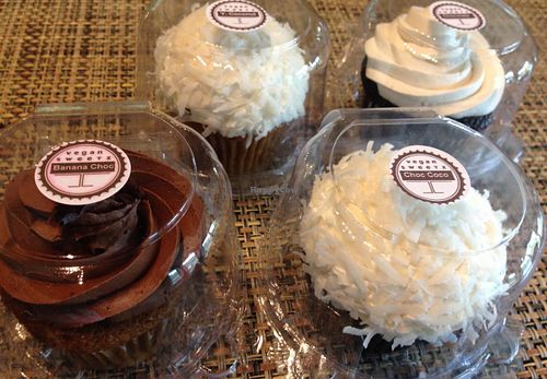 Sweetz Bakery Leesburg VA USA.  These are just a few of many vegan cupcake flavors offered - banana with chocolate frosting, chocolate coconut, yellow coconut, and chocolate cream.  at Sweetz Bakery in Leesburg
