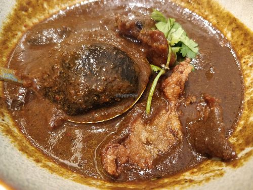 Peranakan signature dish - Buah Keluak at Whole Earth 环界蔬食 in Central Singapore