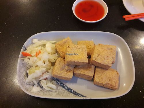 Famous stinky tofu with cabbage salad at Cool Cool in Phnom Penh