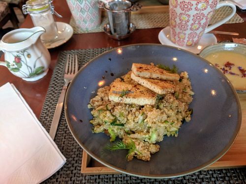 Warm quinoa salad with zucchini, sultanas and tofu and a lentil soup. Both really really good! at Ananda Cafe-Boutique in Neuchatel