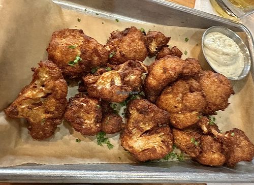 Vegan breaded cauli   at Busboys and Poets - Shirlington in Arlington