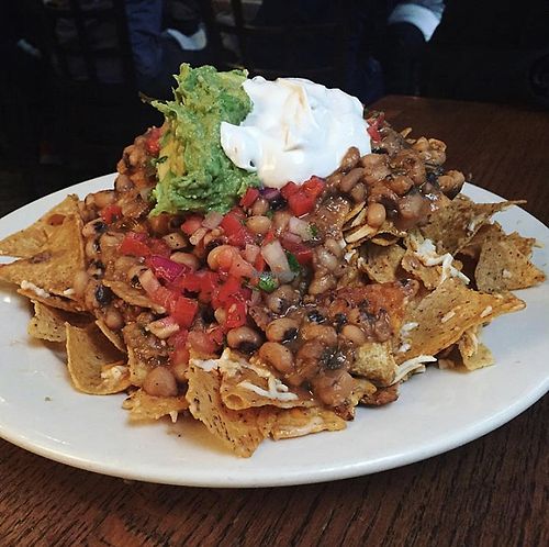 Vegan Nachos.... They are amazing! at Busboys and Poets - Shirlington in Arlington