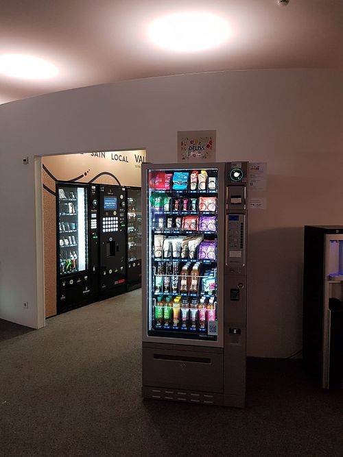 Distributeur du Rolex Learning Center  at DÉLISS in Lausanne