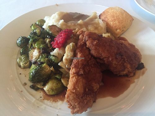 Southern Fried ";chicken"; MASHED POTATOES porchini gravy  CLASSIC STUFFING -- (GF optional)  BRUSSELS SPROUTS crispy shallots/ currants / maple mustard glaze  SWEET POTATO BISCUIT at Crossroads Kitchen in Los Angeles