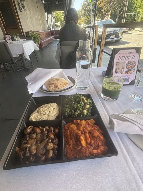 Mezze Plate: butter beans, kale caesar, mushrooms, baba ghanoush (usd $18)  at Crossroads Kitchen in Los Angeles