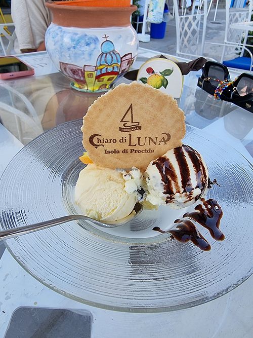 Mandarin and orange-stracciatella at Chiaro di Luna Bar Gelateria Artigianale in Procida