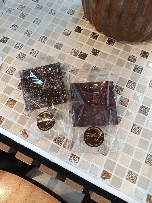 Pistachio and raspberry chocolate at Luado Chocolate - Magazin Poarta Schei in Brasov