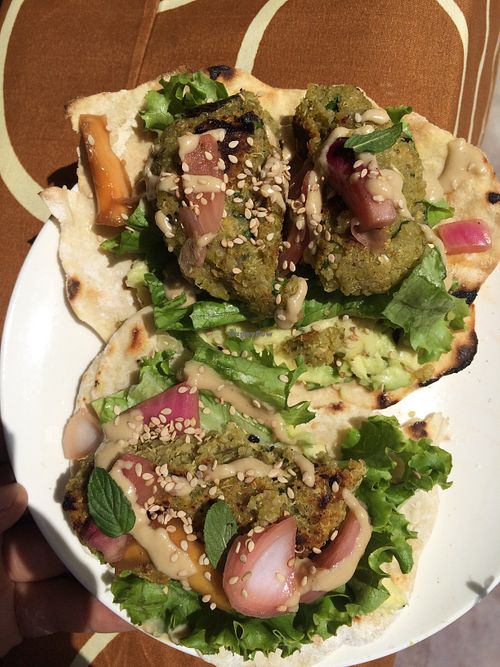 Vegan tortillas with bean burgers, pickles and veggies at Between Tides in Lobitos