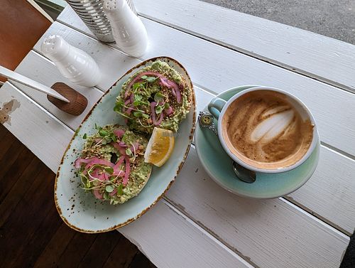 Bagel and coffee at Little Curious Bagels in Whanganui