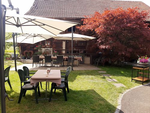 Garden seating at Landgasthof Grossteil in Giswil