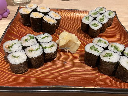 Fermented soybean, cucumber, pickled plum with basili, pickled plum with cucumber (top left to bottom right)  at Kizuna Sushi in Tokyo