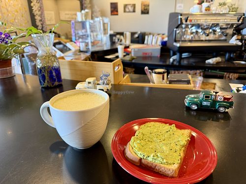 Oat milk matcha latte with avocado toast   at Cafe Quetzal in Topeka