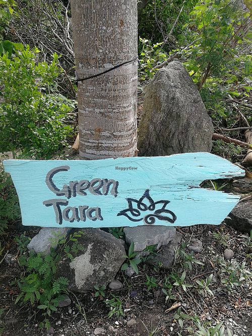 signage by the road at Green Tara in Donghe