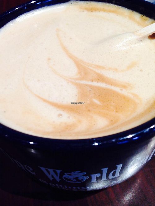 Almond milk latte!! at One World Cafe in Baltimore