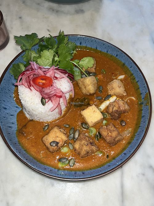 Coconut, sweet potato and tofu curry with rice  at Noya's Kitchen in Bath