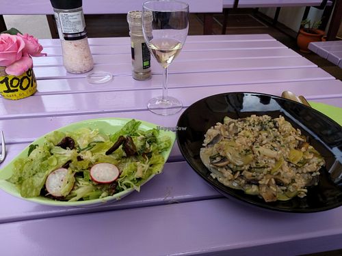 Vegan mushroom and asparagus risotto, salad and wine. All delicious and very reasonably priced. The risotto was the best I've ever had even without all the cream and cheese in a usual recipe.  at Artha in Porec
