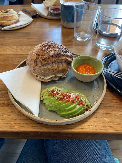 Sourdough bun with vegan cheese and avocado   at Lolo in Svendborg