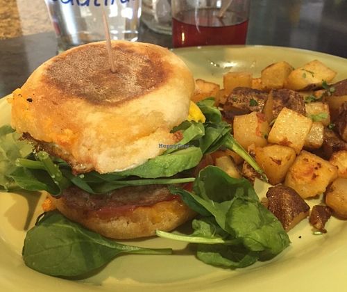 The MF Crawford Breakfast Sandwich -- Two local eggs, spinach, Vegan Sausage, Avocado and Tomato.  Served with Roasted Organic Potatoes  at Great Full Gardens - Midtown in Reno